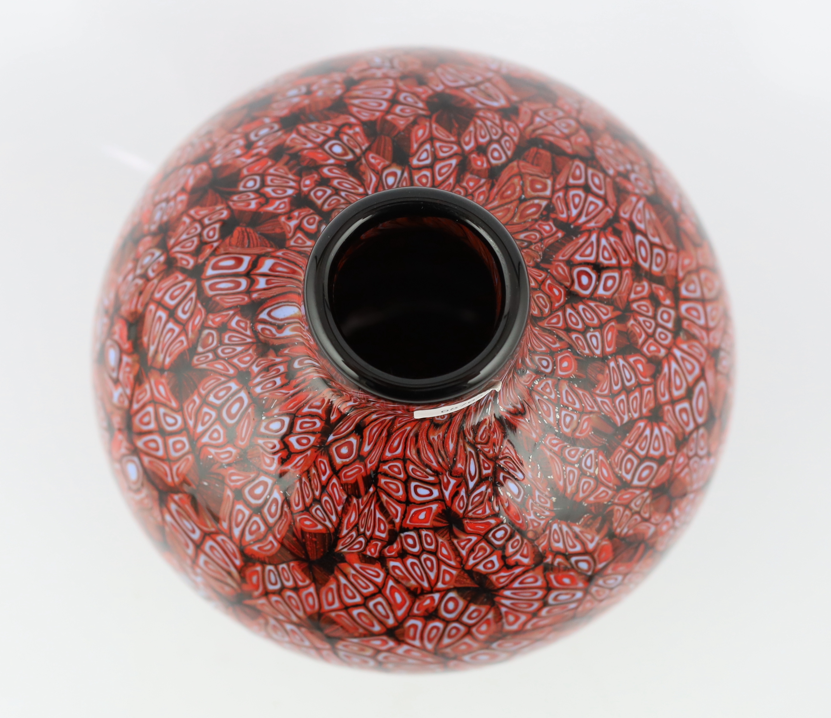 Vittorio Ferro (1932-2012) A Murano glass Murrine ovoid vase, in red, orange and white, unsigned, 21cm, Please note this lot attracts an additional import tax of 20% on the hammer price